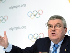 International Olympic Committee, IOC, president German Thomas Bach speaks during a news conference after the executive board meeting of the IOC at their headquarters, in Lausanne, Switzerland, Thursday, Dec. 10, 2015. (Laurent Gillieron/Keystone via AP)