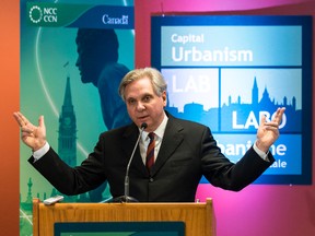 Dr. Mark Kristmanson, Chief Executive Officer of the National Capital Commission, gestures during a press conference in 2014. Errol McGihon/Ottawa Sun files