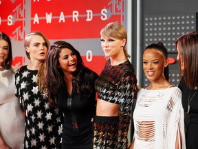 Taylor Swift with pals actress Hailee Steinfeld, model Cara Delevingne, recording artists Selena Gomez, actress Serayah McNeill and model Lily Aldridge (Reuters files)