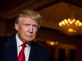 Republican presidential candidate Donald Trump poses for a portrait after an interview with The Associated Press in Sterling, Va., Wednesday, Dec. 2, 2015. Trump says that if he’s elected president, he’ll know within six months whether he can achieve an elusive peace accord between Israelis and Palestinians, one of the world’s most vexing challenges. But the Republican presidential candidate says he has doubts about each side’s commitment to the peace process. (AP Photo/Andrew Harnik)