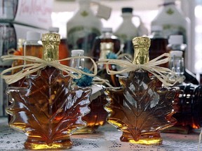 Maple syrup sits for sale at the Old Port market in Quebec City in this April 18, 2000 photo. A late spring caused Canada's maple syrup production to fall for the second consecutive year in 2015 — and El Nino is threatening to put a dent in next spring's output as well. THE CANADIAN PRESS/Jacques Boissinot