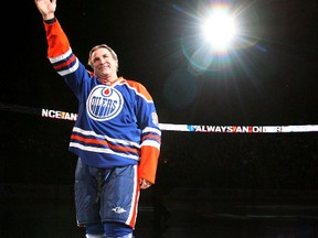 Glen Anderson waves to the crowd during his jersey retirement before the Edmonton Oilers Phoenix Coyotes game at Rexall Place in Edmonton.