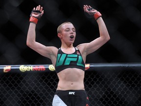 Rose Namajunas celebrates her victory by submission against Paige VanZant during UFC Fight Night in Las Vegas on Thursday, Dec. 10, 2015. (Gary A. Vasquez/USA TODAY Sports)