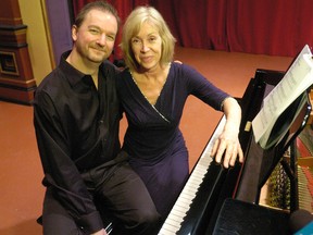 Clark Bryan and Marion Miller enjoy the jostling that inevitably comes with sharing one piano during a piano duet. ?If you?re moving really quickly, you can really cause injury,? says Bryan. (MORRIS LAMONT, The London Free Press)