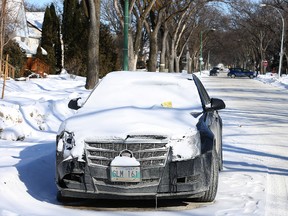 A vehicle with a parking ticket sits on Fleet Avenue earlier this year. (Kevin King/Winnipeg Sun file photo)