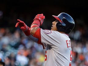 Washington Nationals’ Yunel Escobar celebrates after hitting a home run off San Francisco Giants pitcher Ryan Vogelsong Thursday, Aug. 13, 2015, in San Francisco. (AP Photo/Ben Margot)