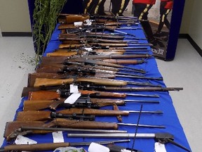 A 32-year-old man is facing numerous charges after police confiscated 37 stolen guns and drugs from a home near Sherwood Park. Supplied.