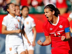 Christine Sinclair of Canada reacts after scoring the go-ahead goal on a penalty kick against China during the FIFA Women’s World Cup play at Commonwealth Stadium on June 6, 2015 in Edmonton. (Kevin C. Cox/Getty Images/AFP)