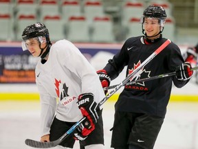 Mitchell Marner, left, and Vince Dunn skate during Hockey Canada's National Teams' Summer Showcase at Winsport in Calgary on Aug. 2, 2015. (Lyle Aspinall/Postmedia Network)