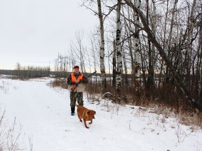 Penny and Neil on a Second Season ruffed grouse hunt. Photo by Neil Waugh