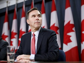 Chris Wattie/Reuters
Canada’s Finance Minister Bill Morneau takes part in a news conference in Ottawa, Canada, December 7, 2015. The new Canadian government's planned tax hike on the rich will bring in less money than forecast and will not cover the cost of a promised middle-class tax cut, according to an official release on Monday. A government document said the tax hike would bring in C$2.01 billion, while the cost of the tax cut would be C$3.44 billion.