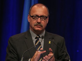 Interim PC leader Ric McIver speaks at the annual Calgary Leaders Dinner at the Telus Convention Centre in Calgary, Alta. on Thursday May 14, 2015. Stuart Dryden/Calgary Sun/Postmedia Network