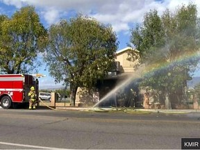 In this image made from video provided by KMIR-TV, firefighters battle flames at the Islamic Center of Palm Springs, a mosque in Coachella, Calif. on Dec. 11, 2015. (KMIR-TV via AP)