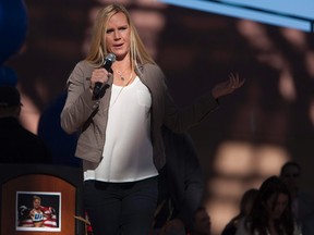 Holly Holm speaks to fans following a parade honoring the UFC Bantamweight champion in Albuquerque, N.M. on Dec. 6, 2015. (Craig Fritz/Reuters)