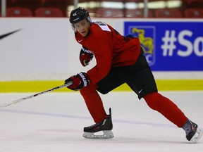 Spencer Watson skates up ice during Team Canada world junior camp practice in Toronto on Friday, Dec. 11, 2015. (Dave Abel/Toronto Sun)