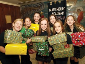 Marymount Academy students in a Grade 7-8 class collected items for care packages that will to be distributed to families staying at Genevra House in Sudbury, Ont. The students delivered the packages on Friday December 11, 2015. John Lappa/Sudbury Star/Postmedia Network