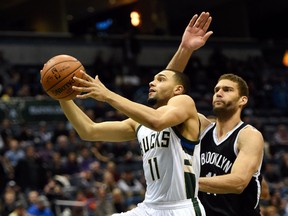 Milwaukee Bucks guard Tyler Ennis (11) takes a shot against the Brooklyn Nets at BMO Harris Bradley Center on November 7, 2015. (Benny Sieu-USA TODAY Sports)