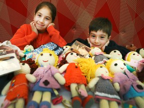 Yara and Yamin Ovfali were on hand at the Hekaia pop-up shop in Toronto on Saturday. Hekaia employs Syrian refugee women in Turkey who make clothes and children’s toys. (Veronica Henri/Toronto Sun/Postmedia Network)