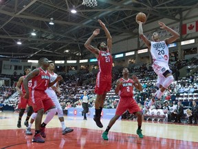 Raptors 905 player Bruno Caboclo (20) drives to the basket against the Maine Red Claws during NBA Development League action at the Hershey Centre in Mississauga, Ontario on Thursday, November 19, 2015. (THE CANADIAN PRESS/Frank Gunn)