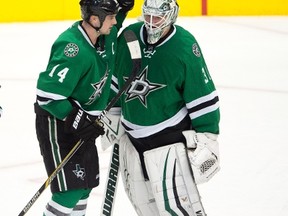Dallas Stars left winger Jamie Benn (14) and goalie Antti Niemi (31) celebrate after the Stars defeated the Philadelphia Flyers 3-1 at the American Airlines Center in Dallas on Dec. 11, 2015. (JEROME MIRON/USA TODAY Sports)