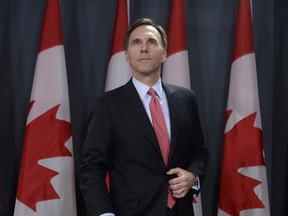 Finance Minister Billl Morneau outlines the Liberal's new tax strategy during a briefing in Ottawa on Monday, Dec. 7, 2015. THE CANADIAN PRESS/Adrian Wyld
