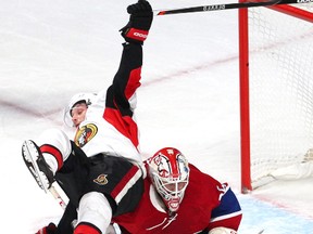 Ottawa Senators right wing Bobby Ryan (6) falls on Montreal Canadiens goalie Dustin Tokarski (35) during the third period at Bell Centre during the Habs 3-1 win Saturday, Dec. 12, 2015. 
Jean-Yves Ahern-USA TODAY Sports