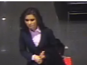 Toronto Police released this surveillance image of Rohinie Bisesar who is accused in the stabbing of another woman at a Shoppers Drug Mart on Friday, Dec. 11, 2015.