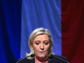 Marine Le Pen, French National Front (FN) political party leader and candidate for the National Front in the Nord-Pas-de-Calais-Picardie region, delivers a speech after results in the second-round regional elections in Henin-Beaumont, France, December 13, 2015.    REUTERS/Yves Herman