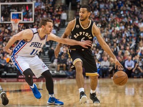Toronto Raptors guard Cory Joseph (6) dribbles down court as Philadelphia 76ers guard Nik Stauskas (11) defends in the third quarter at Air Canada Centre. The Raptors beat the 76ers 96 - 76.Peter Llewellyn-USA TODAY Sports