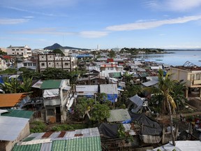 A view of a coastal village with most houses rebuilt after Typhoon Haiyan devastated a coastal village in Tacloban city in central Philippines November 2, 2015, ahead of the second anniversary of the devastating typhoon that killed more than 6,000 people in central Philippines.  REUTERS/Erik De Castro/Files