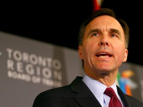 Minister of Finance Bill Morneau speaks at the oronto Region Board of Trade Luncheon at the Hilton Hotel in Toronto on December 14, 2015. (Dave Abel/Toronto Sun/Postmedia Network)