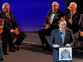 Gary Bettman commissioner of the National Hockey League react the the crowd as they gave him a mix of cheers and boos during Ex-Oilers coach, president and general manager legend Glen Sather's banner raising ceremony at Rexall Place in Edmonton on Friday Dec. 11, 2015. 
Tom Braid/Postmedia Network.