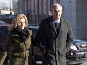 Dennis Oland arrives at the Saint John Law Courts building with his wife Lisa in Saint John, N.B., on December 1, 2015. (THE CANADIAN PRESS/Ron Ward)