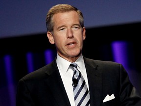In this Oct. 26, 2010 file photo, Brian Williams, then anchor and managing editor of "NBC Nightly News," speaks at the Women's Conference in Long Beach, Calif. A threat of violence against Los Angeles schools brought Williams back on-air for NBC News. In his first appearance since losing his anchor job, Williams handled a NBC News special report Tuesday, Dec. 15, 2015, on the closure of LA public schools. (AP Photo/Matt Sayles, File)