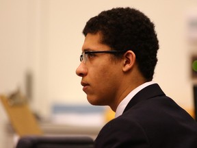 Philip Chism appears in Salem Superior Court, Monday, Dec. 14,2015, during closing arguments. The Massachusetts teenager who raped and killed his high school math teacher "knew right from wrong and could choose right from wrong," a prosecutor said Monday during closing arguments in the teen's murder trial. (Mark Lorenz/The Boston Herald via AP, Pool)