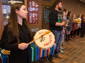 Drummers at Queen's University's West Campus honour the work of the Truth and Reconciliation Commission. Organized by the Aboriginal Teacher Education Program, the drum circle celebrated the release of the commission's final report on Tuesday. (Marc-Andre Cossette/The Whig-Standard)