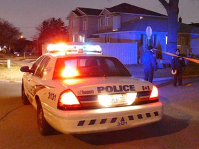 Toronto Police at the scene of a murder on Lachmere Ave. in the Islington Ave and Steeles area Tuesday, Dec. 15, 2015. (Pascal Marchand photo)
