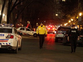 Toronto Police investigate the scene of a stabbing homicide on McGill St., near Yonge and Gerrard, late Tuesday, Dec. 15, 2015. (John Hanley photo)