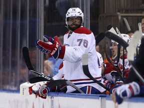 P.K. Subban #76 of the Montreal Canadiens reacts from the bench against the New York Rangers during Game Four of the Eastern Conference Final in the 2014 NHL Stanley Cup Playoffs at Madison Square Garden on May 25, 2014 in New York City.   Elsa/Getty Images/AFP