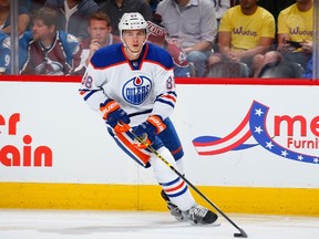 DENVER, CO - MARCH 30: Brandon Davidson #88 of the Edmonton Oilers controls the puck against the Colorado Avalanche at Pepsi Center on March 30, 2015 in Denver, Colorado. Davidson scored his first NHL goal against the Colorado Avalanche to take a 1-0 lead in the first period. Doug Pensinger/Getty Images/AFP