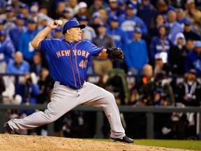 Bartolo Colon #40 of the New York Mets throws a pitch in the twelfth inning against the Kansas City Royals during Game One of the 2015 World Series at Kauffman Stadium on October 27, 2015 in Kansas City, Missouri.   Sean M. Haffey/Getty Images/AFP