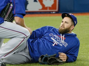 Mike Napoli of the Texas Rangers relaxes during batting practice before the ALDS against the Toronto Blue Jays at the Rogers Centre in Toronto Wednesday October 7, 2015. (Stan Behal/Toronto Sun/Postmedia Network)