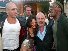 Actor Vin Diesel (L), star of the action film "XXX," poses with co-stars Asia Argento (2ndL), Samuel L. Jackson (R) and the film's director Rob Cohen at the film's premiere August 5, 2002 in Los Angeles. (File photo)