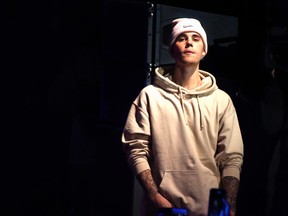 Justin Bieber performs at his sold out charity show at the Danforth Music Hall in Toronto, Ont. on Monday December 7, 2015. Michael Peake/Toronto Sun/Postmedia Network