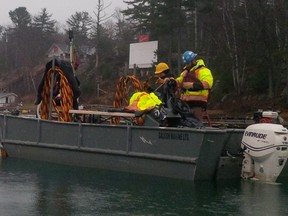On Thursday, a salvage outfit based in southern Ontario is expected to hoist the submerged rig from the community's narrow passage, where it has lain since Dec. 7 after sliding off a barge.