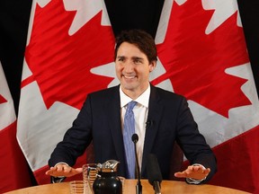 Prime Minister Justin Trudeau speaks with reporters during an interview with The Canadian Press in Ottawa on Dec. 16, 2015. (THE CANADIAN PRESS/ Patrick Doyle)