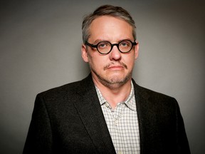 In this Monday, Nov. 30, 2015 photo, director Adam McKay poses for a portrait in Los Angeles. McKay's new film, "The Big Short" opens in theatres on Dec. 23, 2015.  (Photo by Rich Fury/Invision/AP)