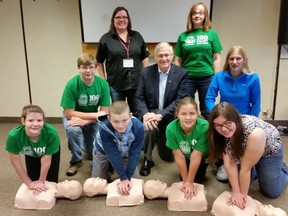 Kids from the 4H Club were the first to receive free first aid training from the Canadian Red Cross, as part of a funding deal from the Ontario Trillium Foundation. Ernie Hardeman (centre) was on hand for the kick-off earlier this month. (Submitted)