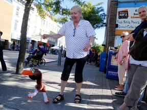 EMILY MOUNTNEY-LESSARD/Intelligencer file photo
Carol Feeney of the Quinte Arts Council, dances a puppet down the street during Flavours of Fall and Culture Days events in events held downtown this past September.