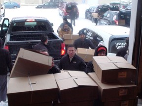 Dilawri's Crown Auto Group delivered nine tons of turkeys to the Christmas Cheer Board Dec. 17, 2015.